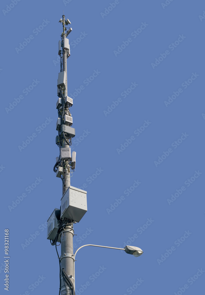 Fototapeta premium Telecommunication tower on background sky