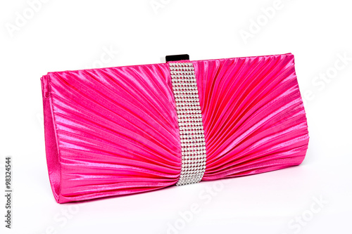 pink clutch with diamonds on a white background photo