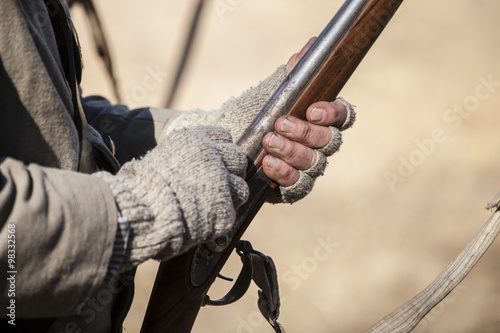 hands and muzzle loader photo