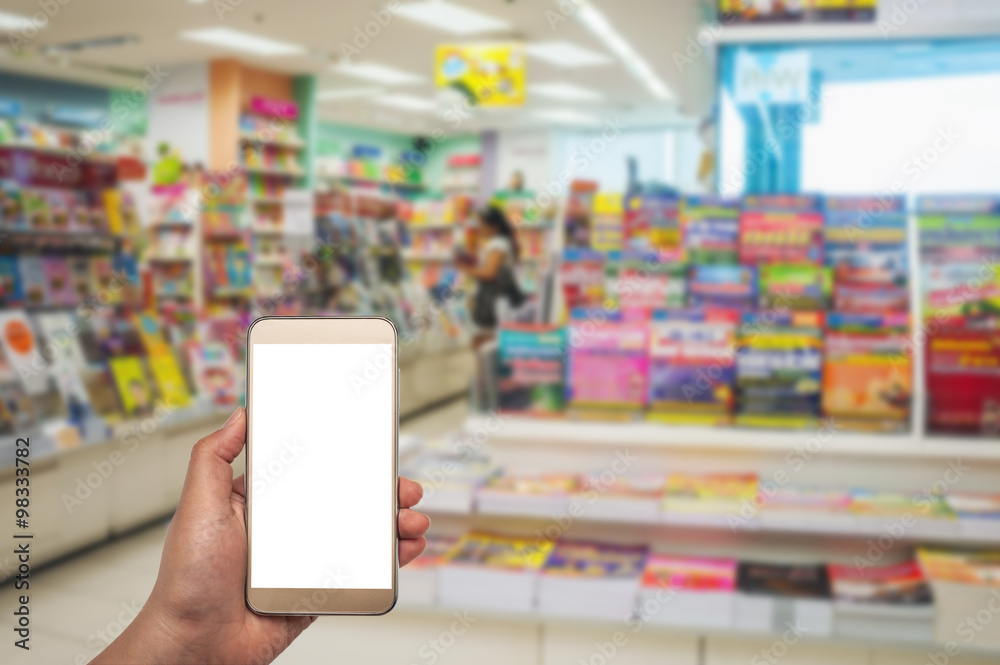 Smart phone white screen in hand on blurred background Smart phone white screen in hand on blurred background