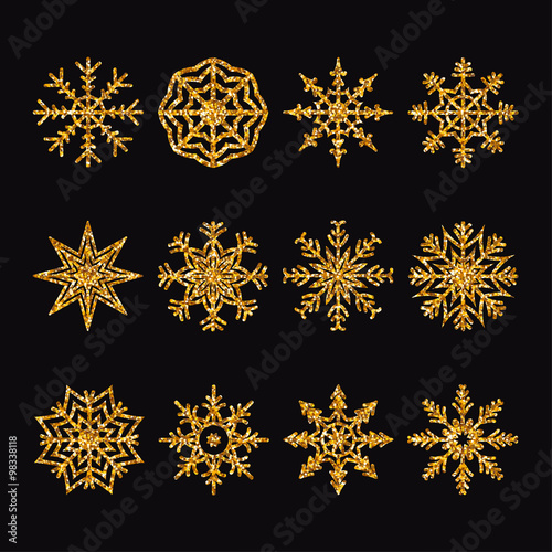 Set of gold shiny snowflakes.