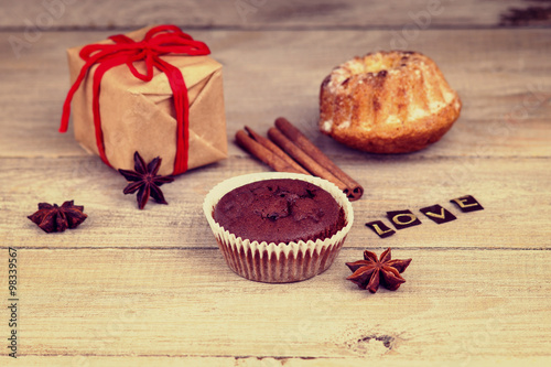 Muffins, gift box and word love