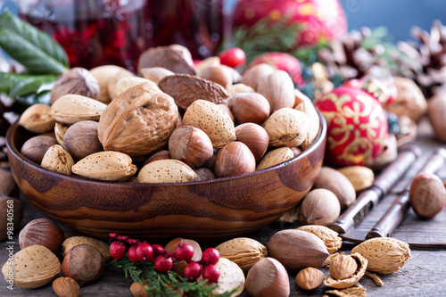 Variety of nuts with shells in a bowl