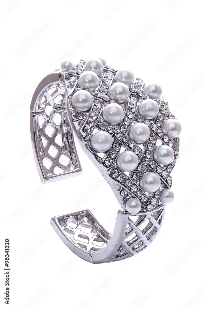Obraz premium Silver bracelet with pearls on a white background