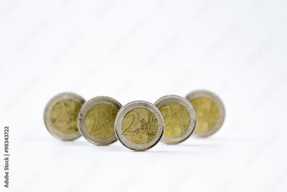 Two euro coins in a row isolated on a white background
Two euro coins in a row isolated on a white background