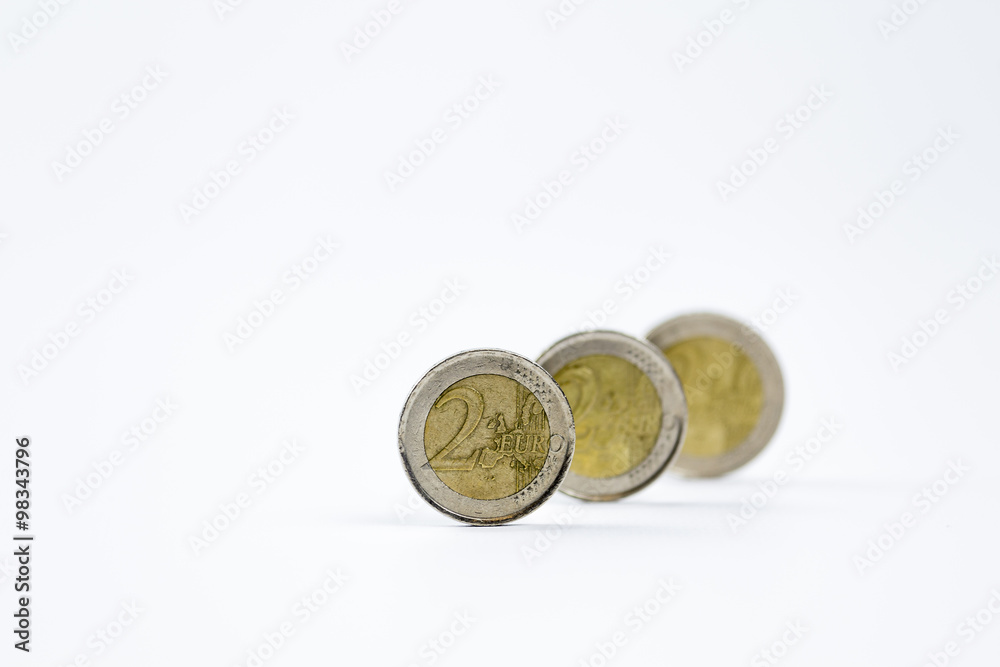 Two euro coins in a row isolated on a white background
Two euro coins in a row isolated on a white background