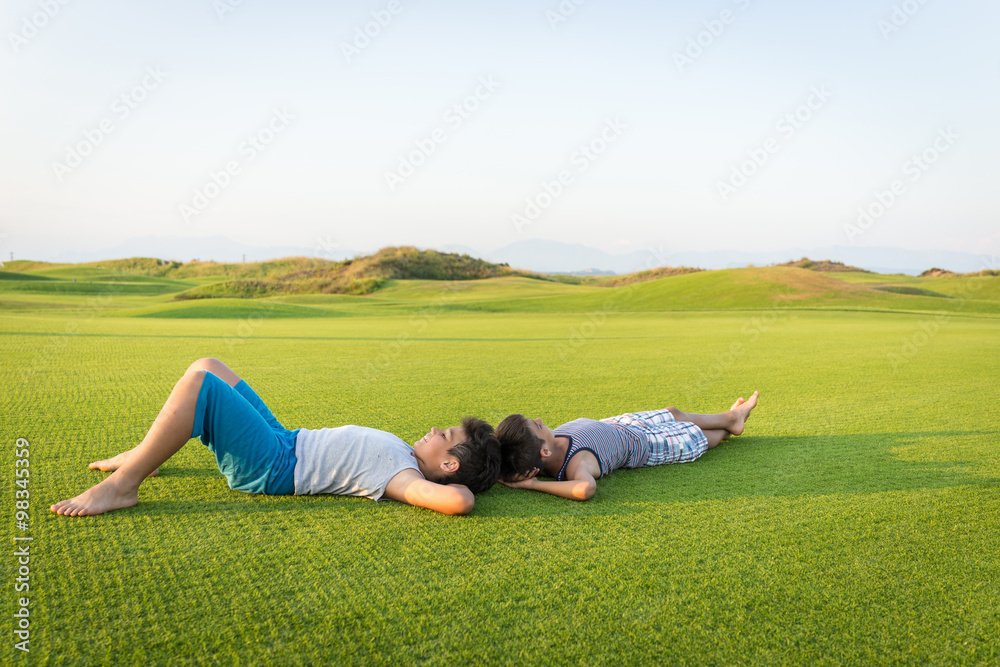 The best summer holiday vacation laying on perfect green grass The best summer holiday vacation laying on perfect green grass
