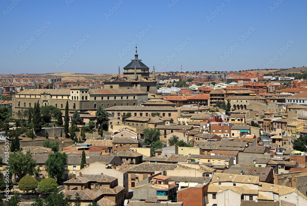 TOLEDO, SPAIN - AUGUST 24, 2012: Aerial view of Toledo. Hospital de Tavera - Musum  Duque de Lerma