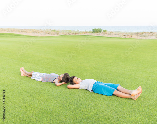 The best summer holiday vacation laying on perfect green grass