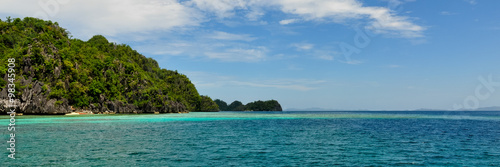 Landscape of deep blue sea and green Island