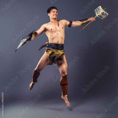 The warrior in the image of the ancient world. Strike of the ham