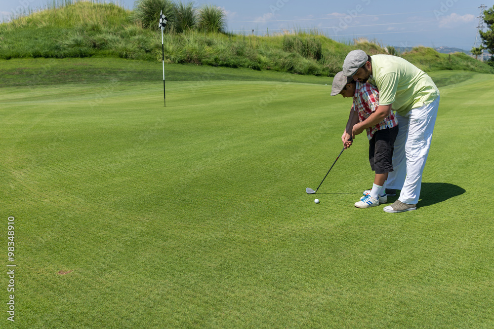 Fototapeta premium Man playing golf at club