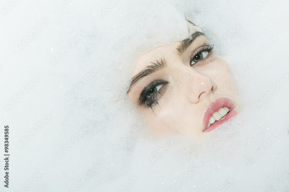 Female face in foam Female face in foam