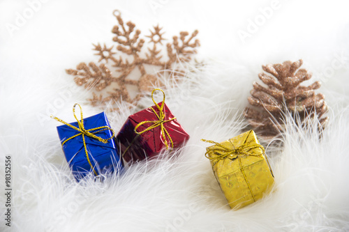Snowy Background with gift boxes and snowflake