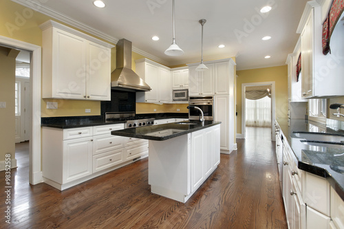 Kitchen with white cabinetry