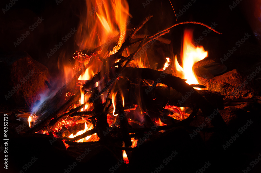 Campfire closeup at night with long exposure shot in the mountain Tajamulco Campfire closeup at night with long exposure shot in the mountain Tajamulco