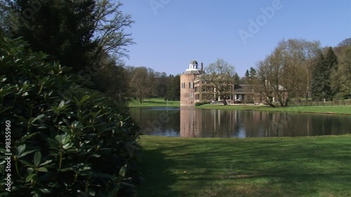 Rozendaal Castle + pan pond and park to road. Castle of Rozendaal (Kasteel Rosendael) is a medieval monument in The Netherlands. photo