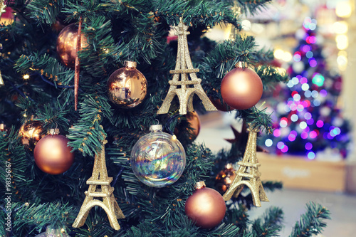 Christmas tree decorated with toys in the form of the Eiffel tower