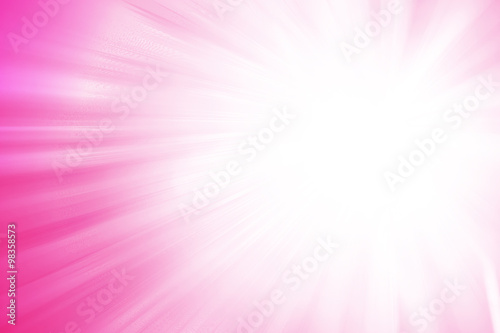 Pink glitter sparkle defocused rays lights abstract background.