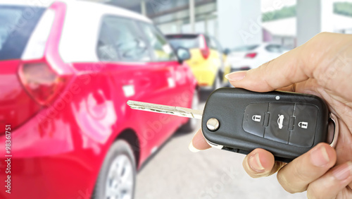 hand with car key