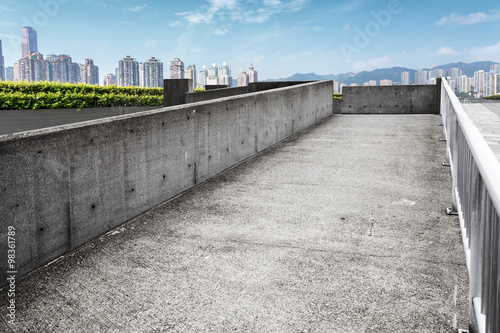 skyline and empty footpath by building