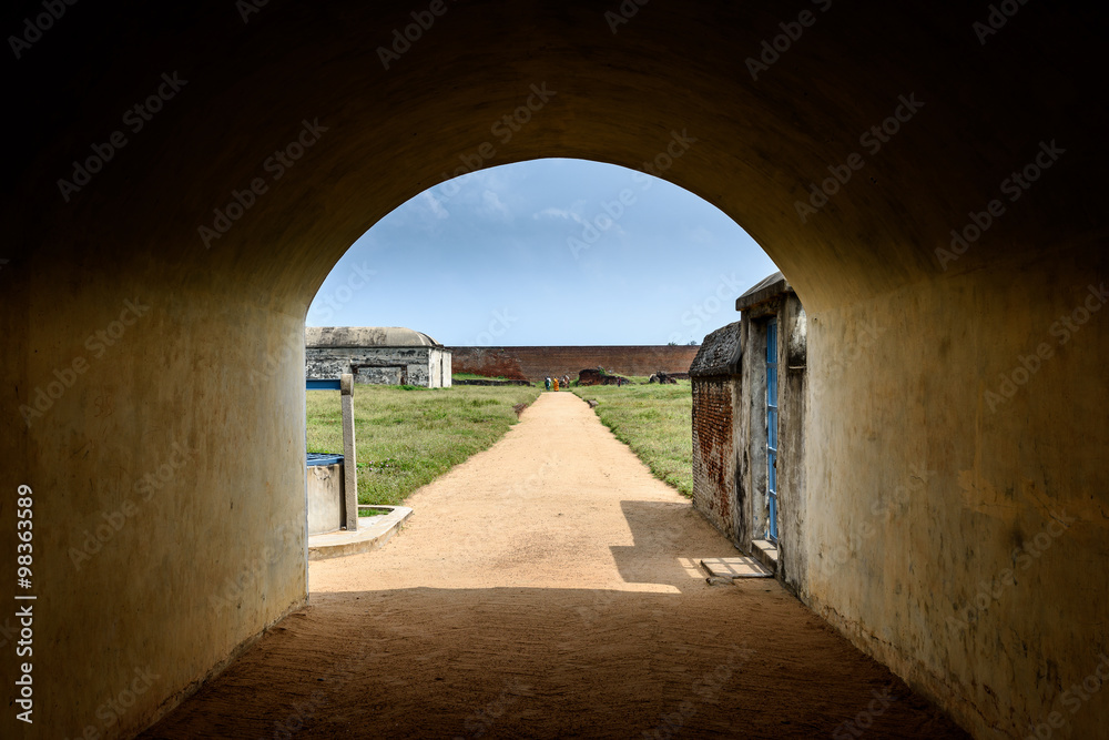 Entrance archway to old warehouse in Dutch fort in India