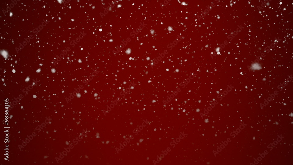 Beautiful Snowfall in front of a Red Background - seamless loop