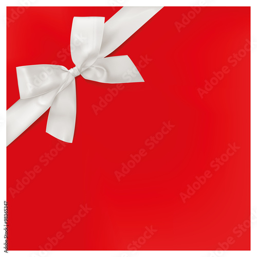 Invitation with white ribbon on red background.