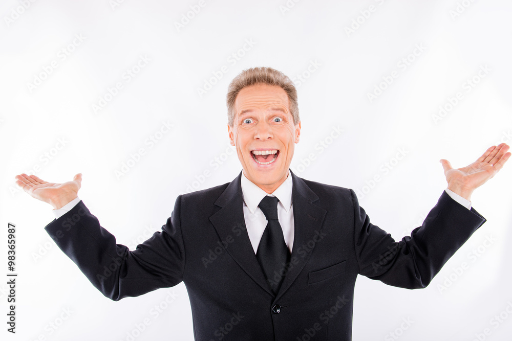 A portrait of satisfied mature man with beaming smile A portrait of satisfied mature man with beaming smile