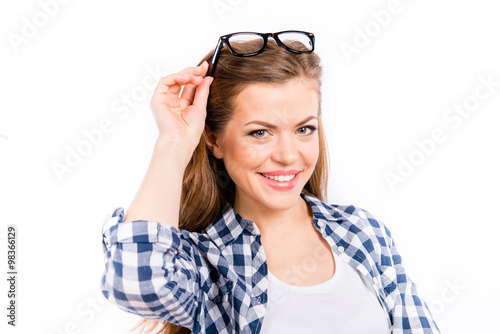 beautiful sexy young woman with glasses on head smiling