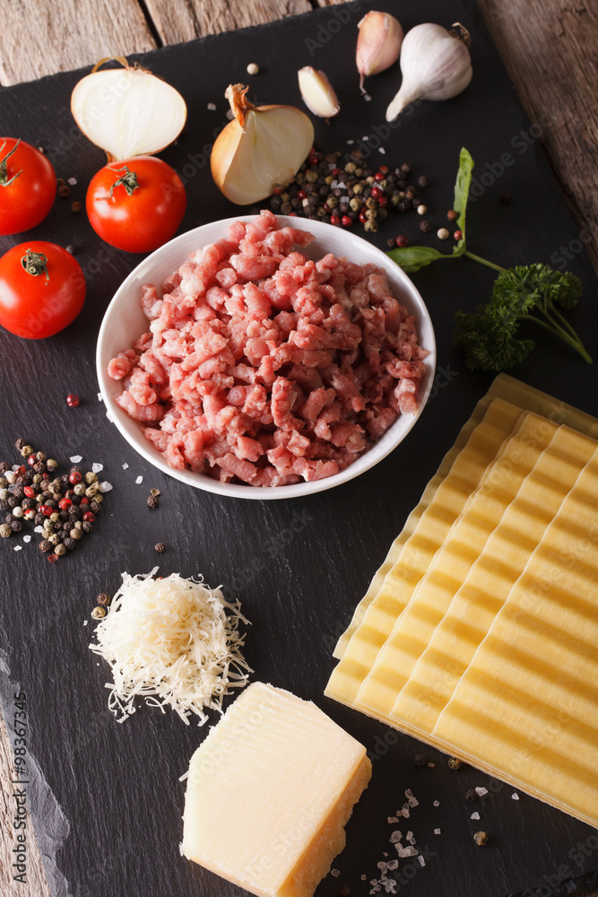 Ingredients for classic Italian lasagna close-up. vertical

