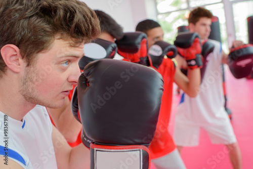 Young men in boxing class
