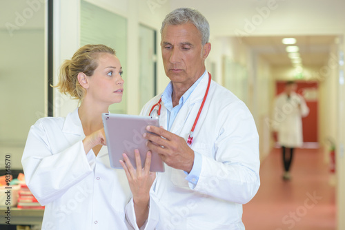 Two doctors conferring