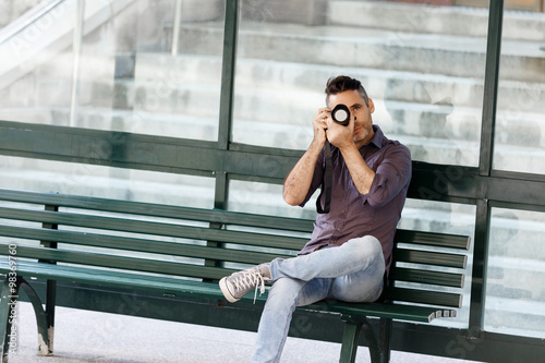 Male photographer taking picture