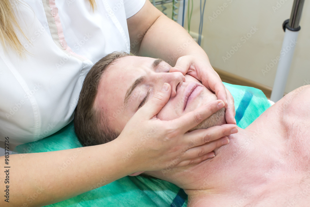 man in the mask cosmetic procedure in spa salon man in the mask cosmetic procedure in spa salon