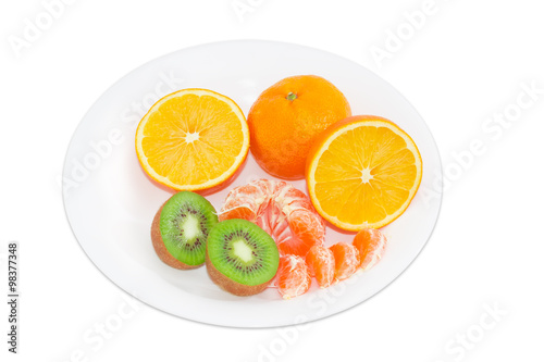 Different fruits on a white dish