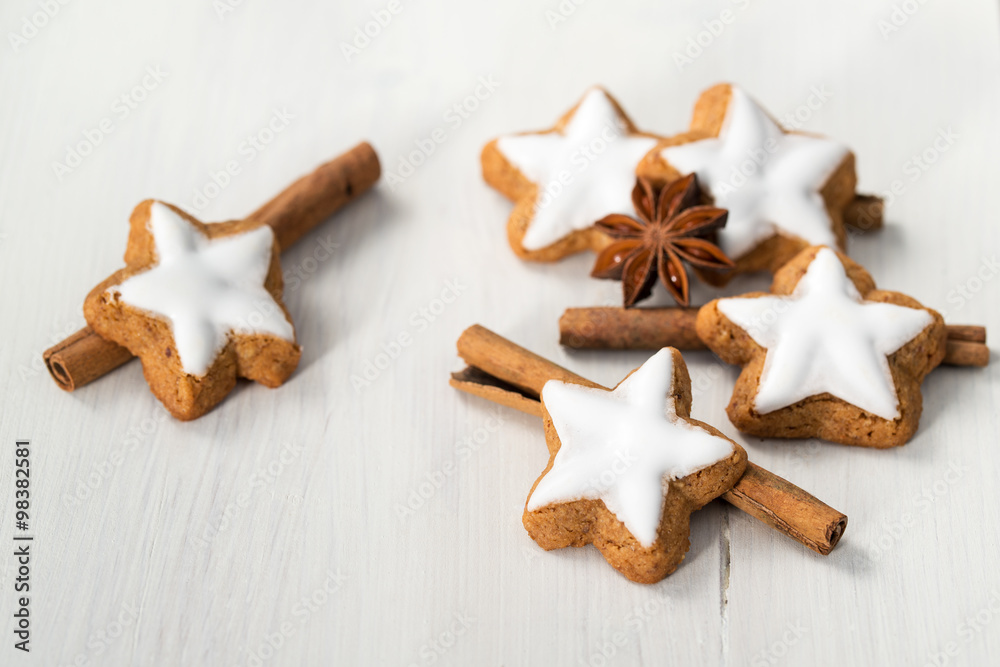 Star cookies with cinnamon sticks and anise stars