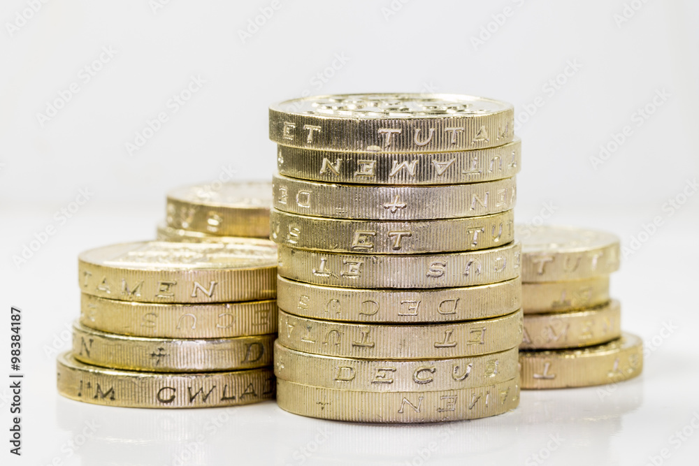Piles of British Pound Coins (with reflection) Piles of British Pound Coins (with reflection)