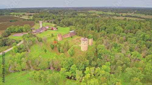 Aerial shot of the area where the old castle is located. Lots of trees on the forest surounding the area in Vastseliina photo