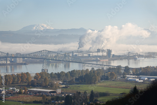 Longview, Washington State, Mount St. Helens. The Lewis and Clark Bridge crossing the Columbia River between Washington and Oregon. Mount St. Helens in the background. 
 photo