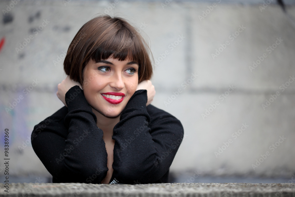 Smiling girl in urban background