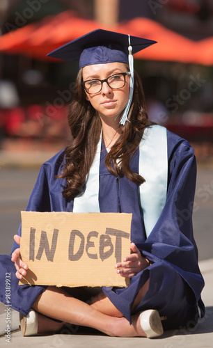 Graduate Sitting with Debt