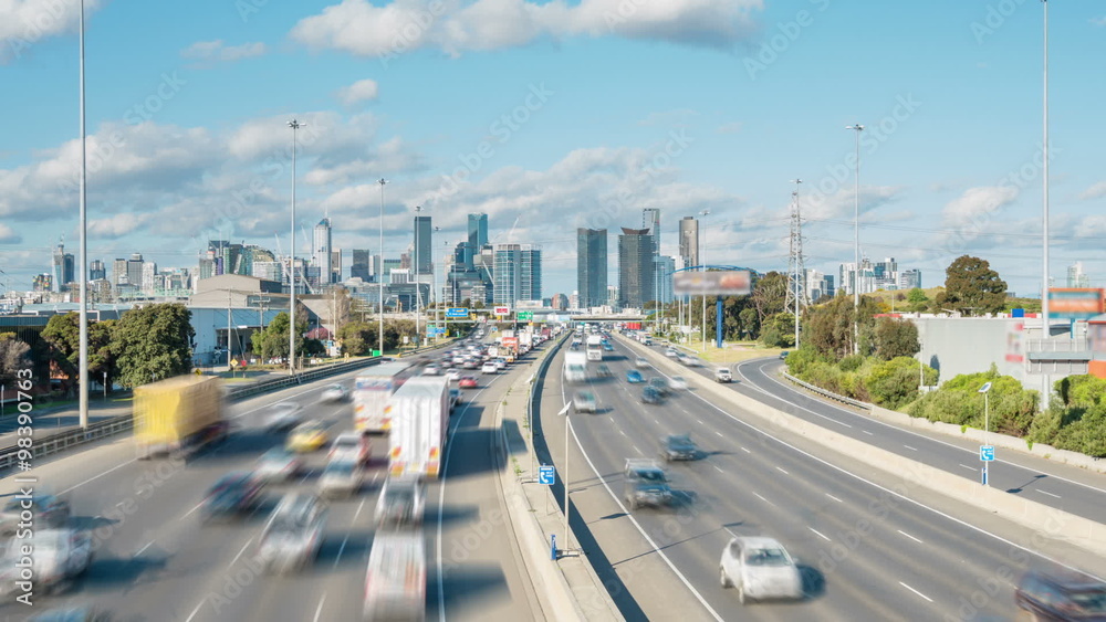 Timelapse video of highway traffic congestion and cbd of a city