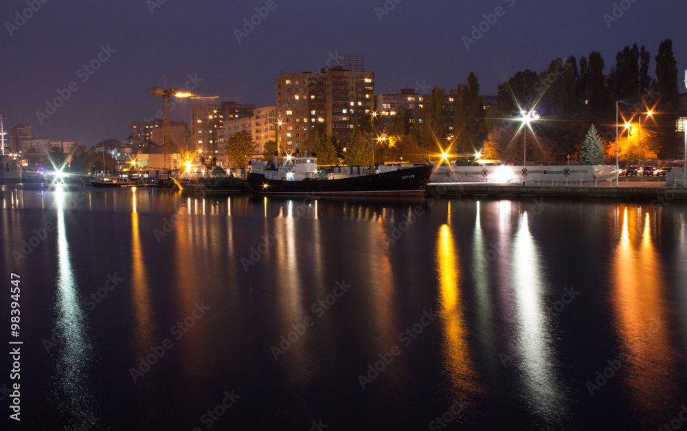 Night City Lights / The lights of night city of Kaliningrad of the Russian Federation, ships, boats on the river.