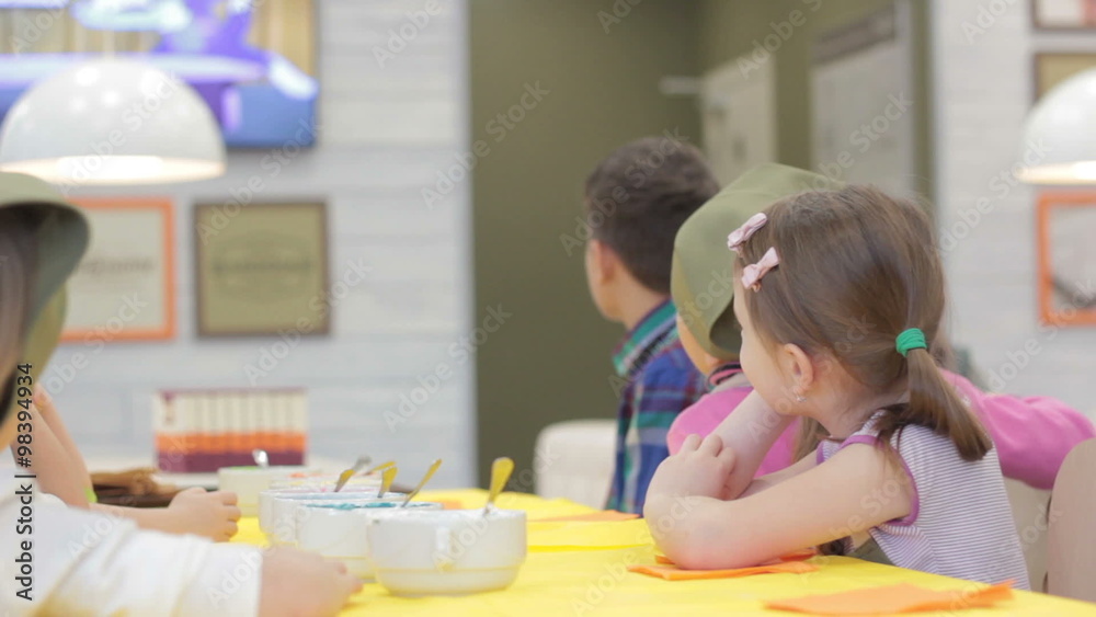 Children watching television cartoons