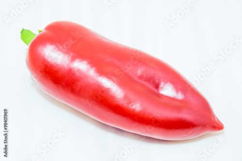 Fresh red pepper on a white background 