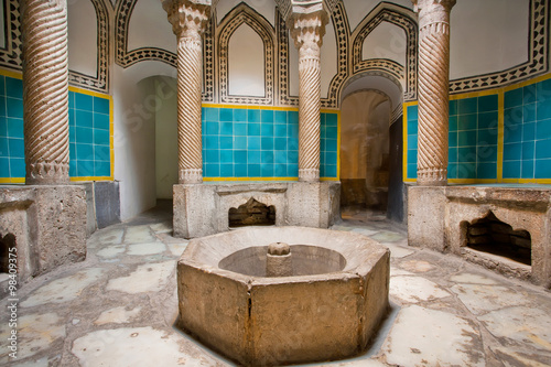 Corridors of historical hamam bath in oriental style with columns photo