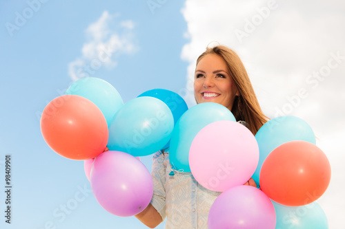 teen girl with colorful balloons