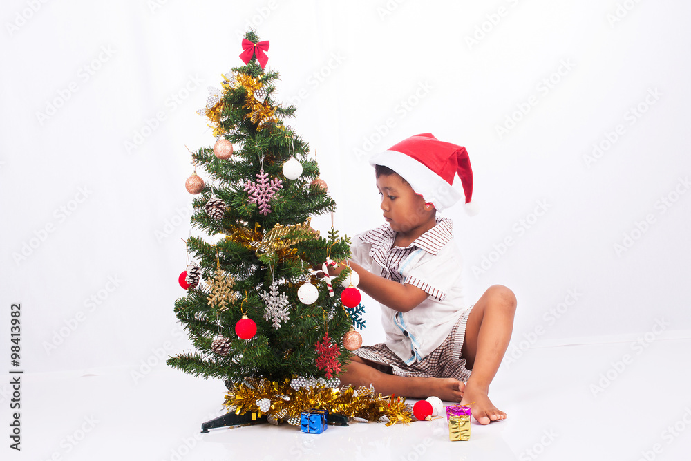 cute boy play christmas tree collection