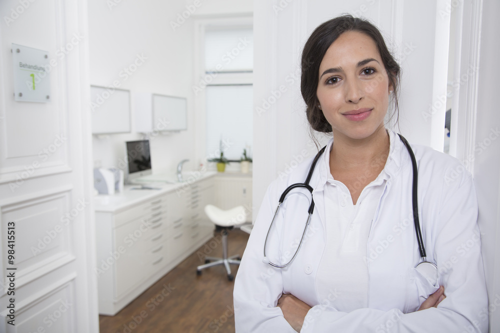 Portrait of smiling doctor at medical practice
